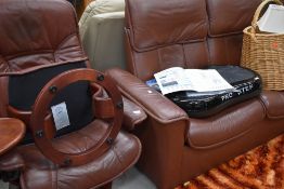 A brown leather three piece stressless suite by Ekornes, settee looks newer than the chairs,