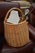 A wicker basket and two table lamps