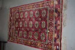 A Turkmen style carpet/rug , approx. 149 x 92cm