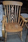 A traditional stripped rocking chair