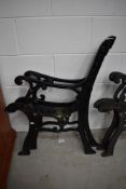 A pair of cast bench ends