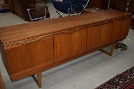 A vintage teak Long John style sideboard, width approx. 198cm