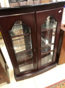 A modern mahogany effect display cabinet, width approx. 46cm