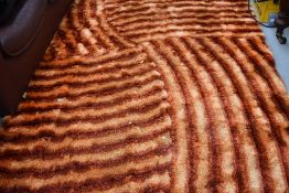 A modern vintage style orange rug