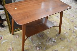 A vintage sapele coffee table, approx 76 x 46cm, with splay legs and undertier