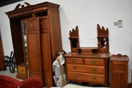 A restored Victorian wardrobe, dressing table and pot cupboard