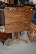 A 19th Century oak tilt top table on triple splay legs, top approx 78 x 73cm