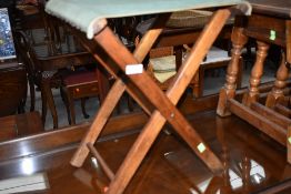 A vintage folding camping style or similar stool