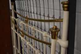 A Victorian style cast and brass single bed
