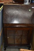 A vintage stained frame bureau with bookcase under