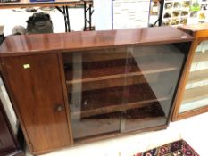 A vintage mahogany bookshelf with side cupboard, width approx. 106cm