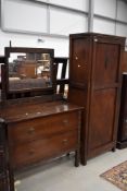 An early to mid 20th Century oak dressing table and stained frame hall or small wardrobe