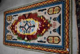A traditional wool fireside rug, approx. 168 x 90cm