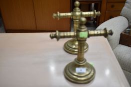 A pair of antique brass altar crucifixes , height approx. 22cm