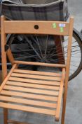 A folding wooden chair