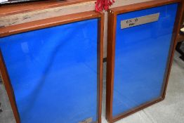 A pair of glazed wall display/noticeboards, each approx 83 x 53cm