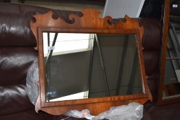 A Reprodux Chippendale style wall mirror