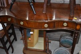 A reproduction mahogany and inlaid serpentine front side table, having triple frieze drawer, width