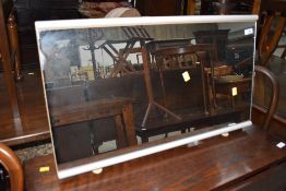 A modern free standing wide dressing table style mirror, width approx. 75cm