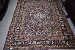 A traditional fine carpet square , approx. 196 x 140cm, nice bright colours some fraying to edges