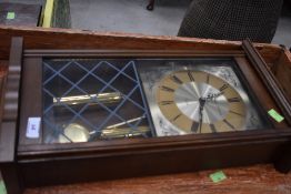 A modern wall clcok, stamped London Clock Company