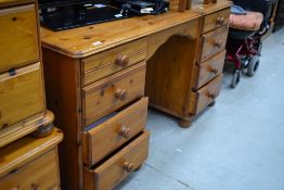 A modern pine dressing table, width approx. 137cm