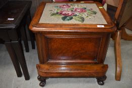 A Victorian mahogany step commode having woolwork top
