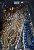 A selection of costume jewellery including white metal chain, beads, bangles etc