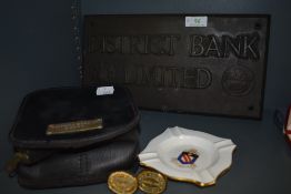 An antique cast sign 'district bank limited' two brass stamps and similar banking related