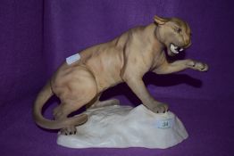A large Beswick Puma on rock.