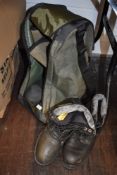 A pair of Bison neoprene topped boots in bag,around a size 12, and a pair of caterpillar boots,