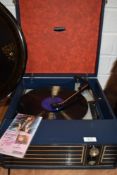 A vintage Fidelity portable record player.