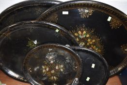 Five vintage lacquered trays with inlaid details and gilding,various sizes, two being a very good