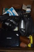 A selection of photographic equipment lens and cameras including Praktica and Polaroid