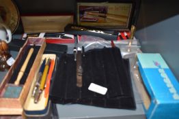 A selection of pens including fountain pens, biros and retracting pencils, Parker and Sheaffer