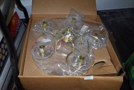 A brass ceiling light in box.