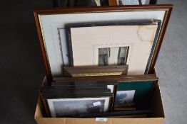 A selection of prints etchings and picture frames