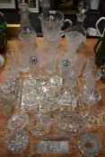 A selection of clear cut and crystal glass wares including hand blown decanter cut and etched