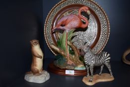 A selection of figurine,including zebra,flamingo and Aynsley otter also a micro mosaic charger.AF