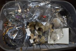 A box of costume jewellery including earrings, cufflinks and bangles