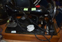 A vintage Singer 99K sewing machine.