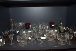 A mixture of vintage glass including etched fruit glasses or similar, amber coloured glass stemmed