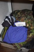A selection camouflage clothing and similar in metal trunk.