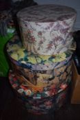 Three decorative hat/gift boxes.