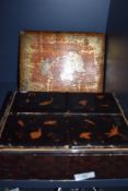 A Japanese lacquer jewellery box well detailed with imagery of insects and turtle mythology