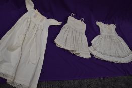 Two early 20th century childrens dresses with beautiful cut work and embroidered techniques used,