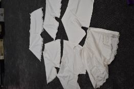 Six pairs of late 19th/20th century knickers,all with beautiful details to each,from lace to