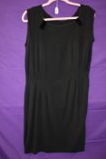 A vintage 1930s black dress with darted bodice and velvet accents,no fastening, medium size approx.
