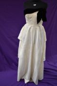 A London Town strapless cream watered taffeta gown with tiered skirt to back and black velvet