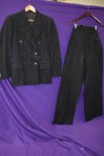 A vintage 1940s gents double breasted grey pinstripe suit, comprising of jacket and fish tail backed